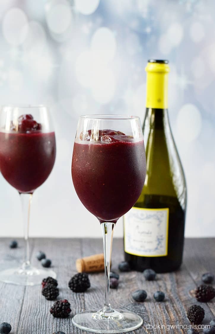 Blended berries and wine in two wine glasses.