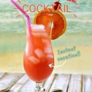 A bright pink Bahama Mama drink in a hurricane glass garnished with an orange wheel, cherry, and pink paper umbrella on the beach with title graphic across the top.