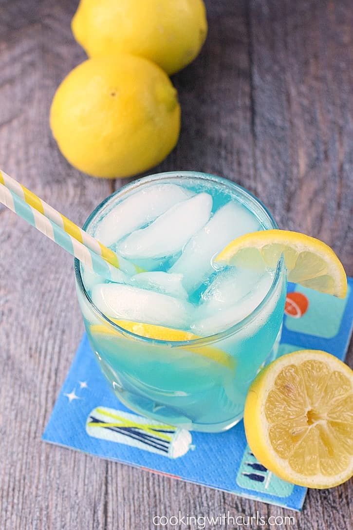 Cool off this summer with a refreshing Blue Lemonade Cocktail! cookingwithcurls.com