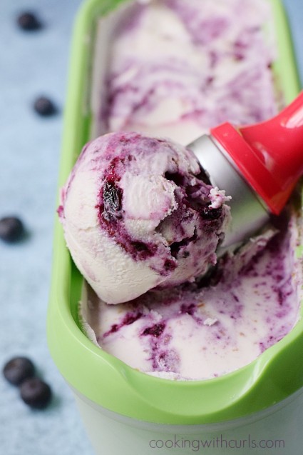 Rich and creamy Blueberry Cheesecake Ice Cream is the perfect ending to any meal | cookingwithcurls.com