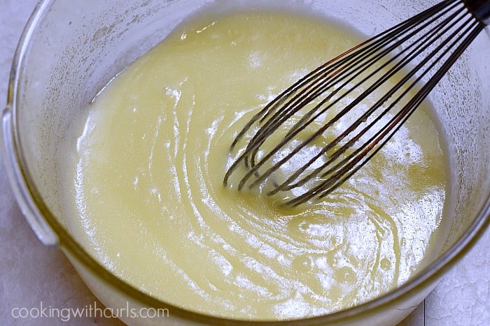 Butter and sugar whisked together in a different glass bowl.