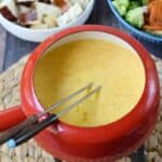 Cheese Fondue with Beer - served with vegetables, bread, and a few surprises | cookingwithcurls.com