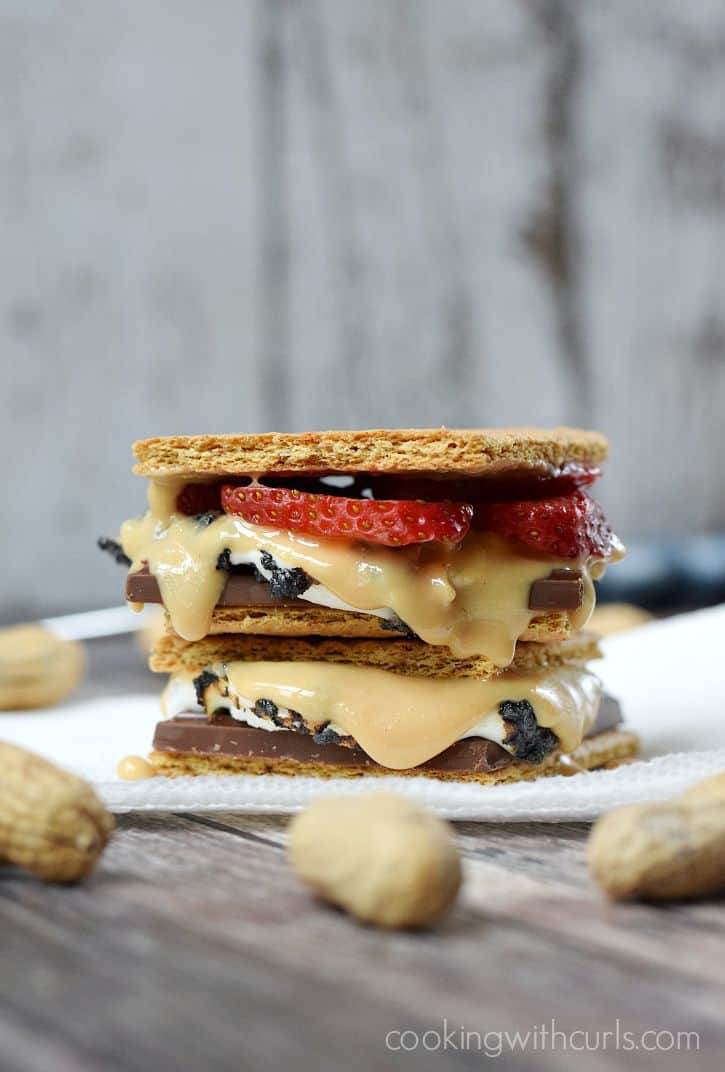 Take your S'mores to a whole new level with the addition of sliced strawberries and homemade peanut butter | cookingwithcurls.com #LetsMakeSmores #Ad