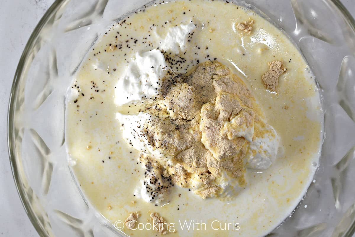 Greek yogurt, seasonings, and milk in a large mixing bowl. 