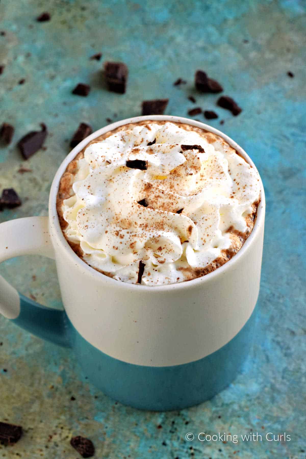 Caffe Mocha topped with whipped cream and chocolate shavings.