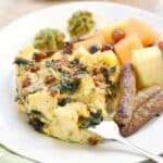 Sourdough Breakfast Strata with sun-dried tomatoes, spinach and fontina cheese is perfect for brunch!! cookingwithcurls.com