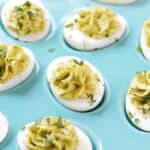 Sweet Pea Deviled Eggs in a pale blue egg plate