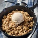 A delicious Apple Crisp for Two hot out of the oven topped with ice cream | cookingwithcurls.com