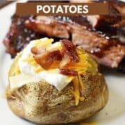 A baked potato topped with butter, sour cream, grated cheddar, and bacon chunks with a stack of barbecue ribs in the background and title graphic across the top.