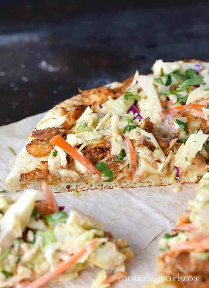 Barbecue Chicken Pizza topped with a creamy, Apple Coleslaw is the perfect way to change up pizza night | cookingwithcurls.com