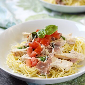 Fresh tomatoes and basil make this quick and delicious Chicken with Basil Cream on Angel Hair Pasta a perfect summer meal | cookingwithcurls.com
