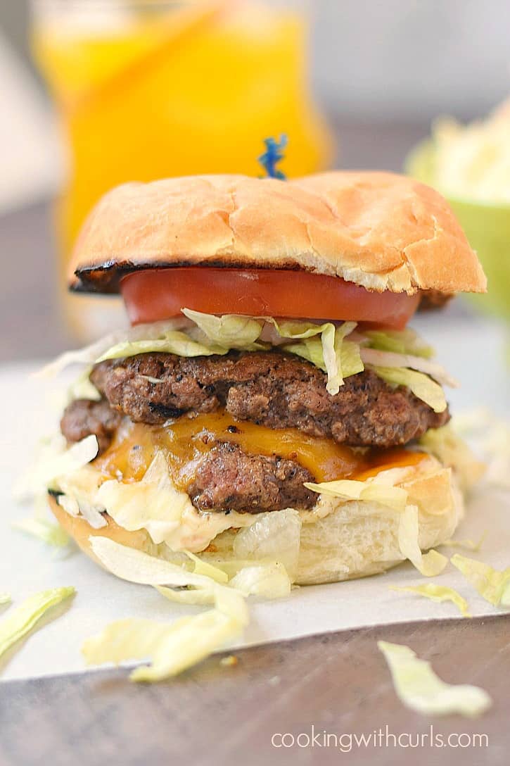 Amazing Smashed Burgers layered with cheese and flavor! cookingwithcurls.com