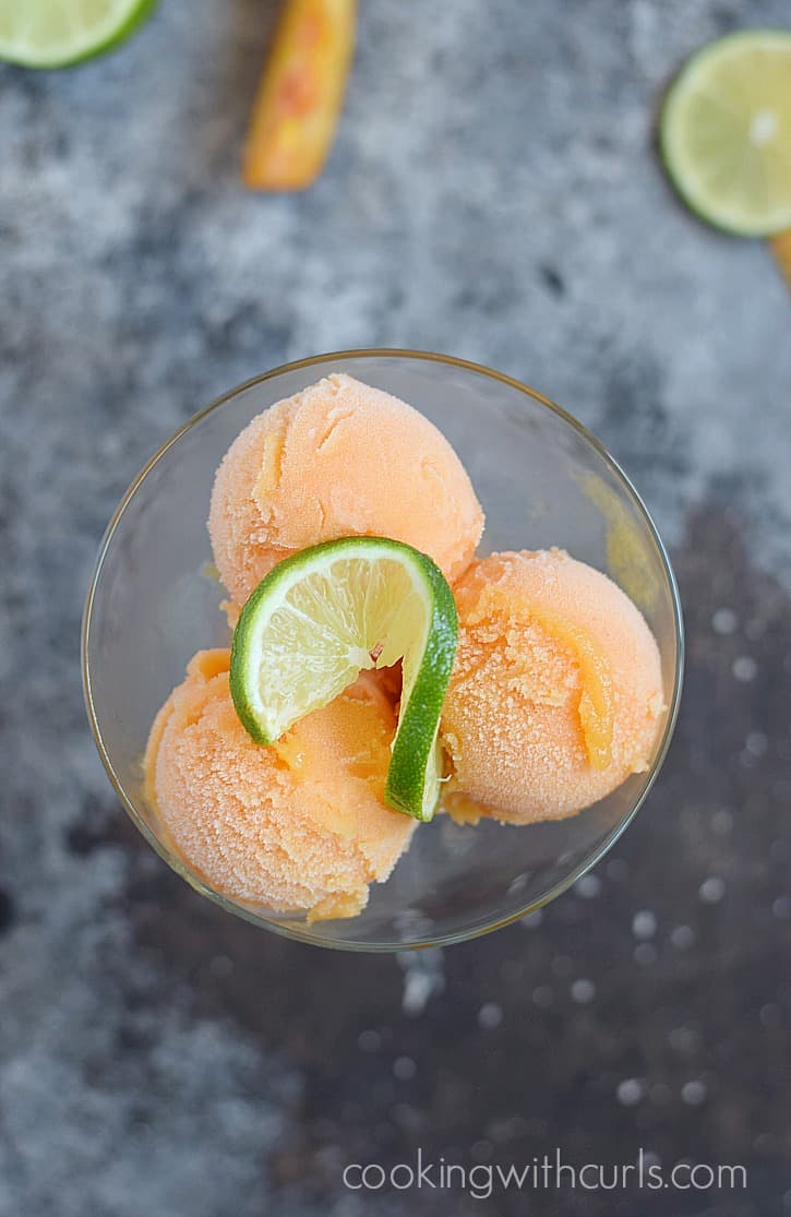 Cool off this summer with an extra special treat, a light and refreshing Peach Margarita Sorbet | cookingwithcurls.com