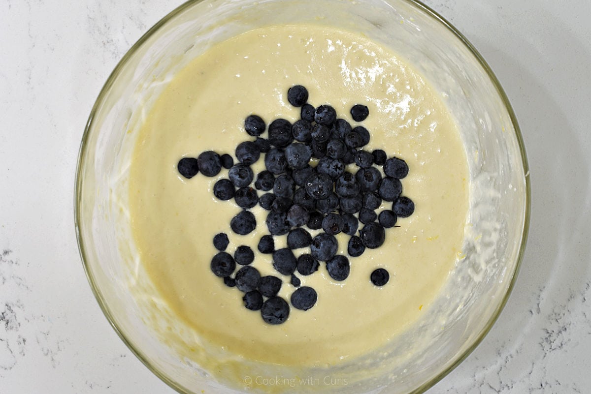 Fresh blueberries in lemon waffle mix.