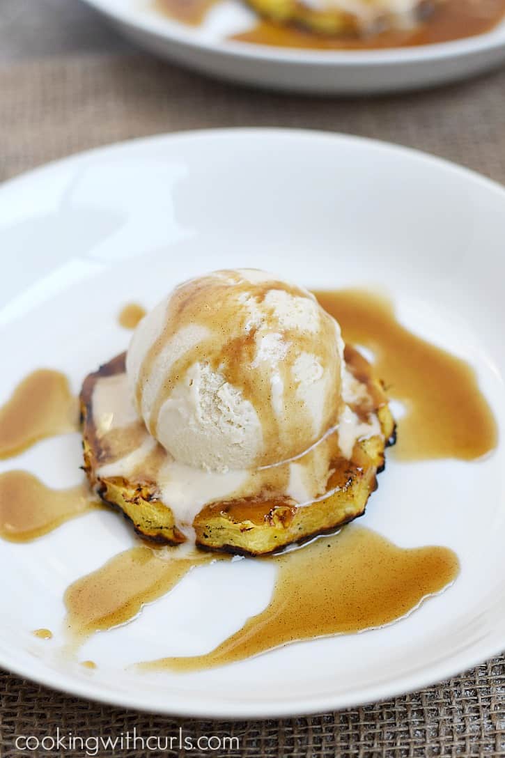 Grilled Pineapple Sundaes topped with vanilla ice cream and coconut rum caramel sauce is the perfect summer dessert | cookingwithcurls.com