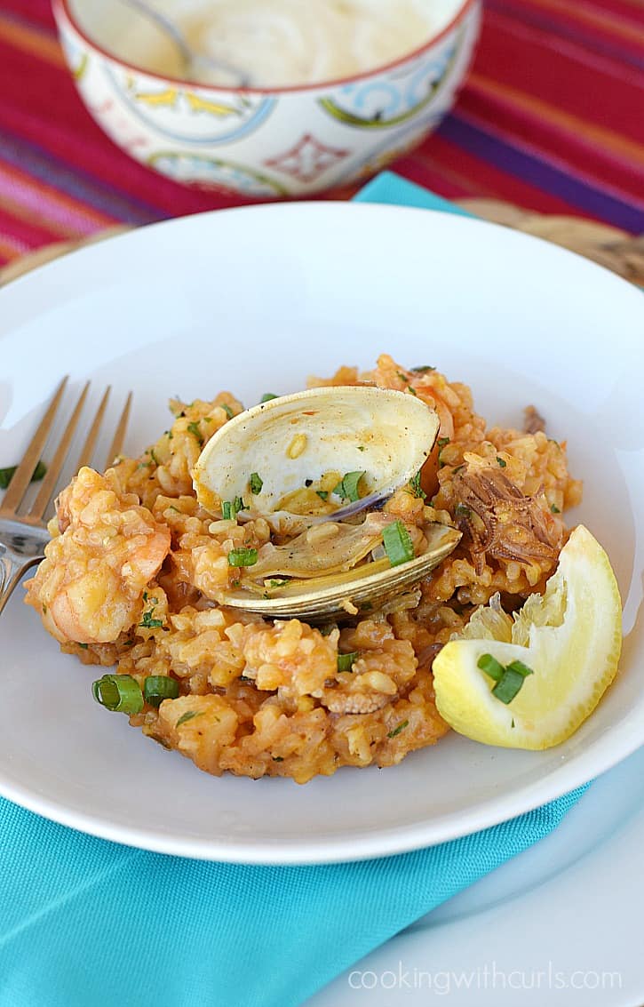 Msg 4 21+ Let your taste buds take you on an adventure to Spain when you dine on this traditional Seafood Paella | cookingwithcurls.com #ArtofEntertaining #ad