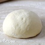 Traditional Italian Pizza Dough made from scratch for the perfect light and airy pizza | cookingwithcurls.com