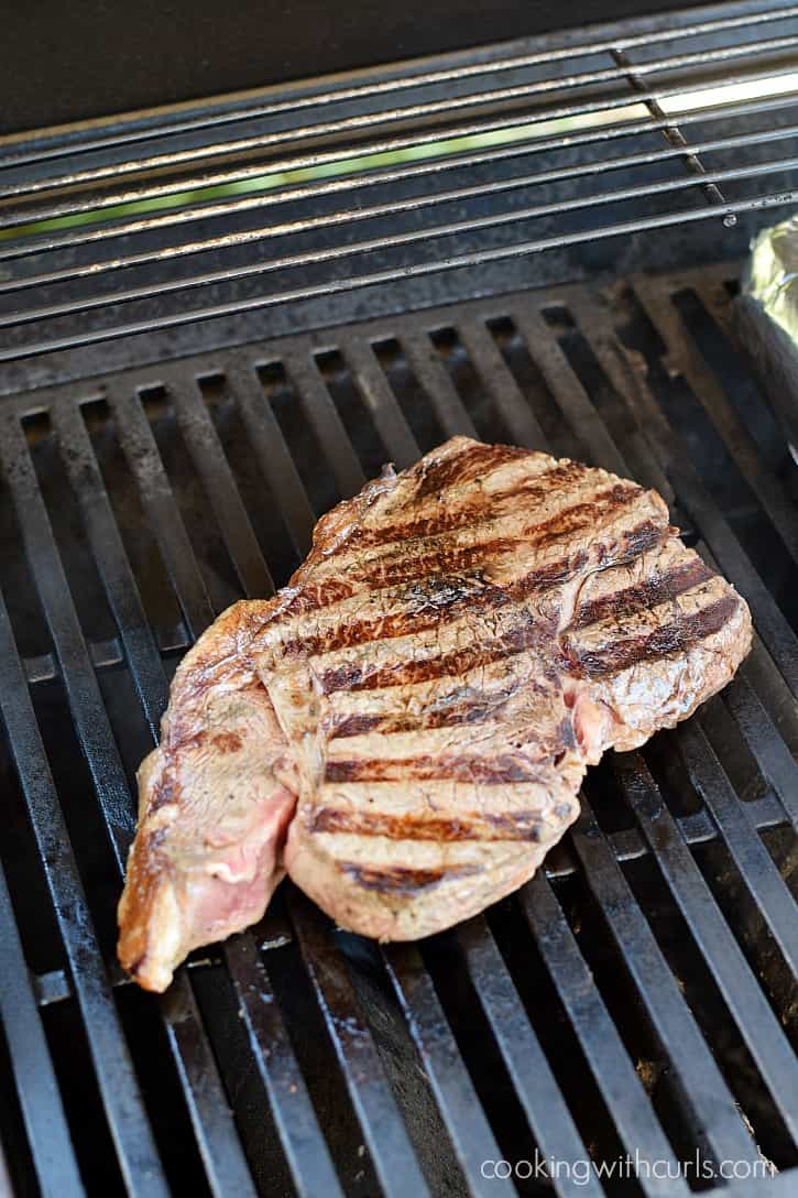 Grilled steak on the grill.