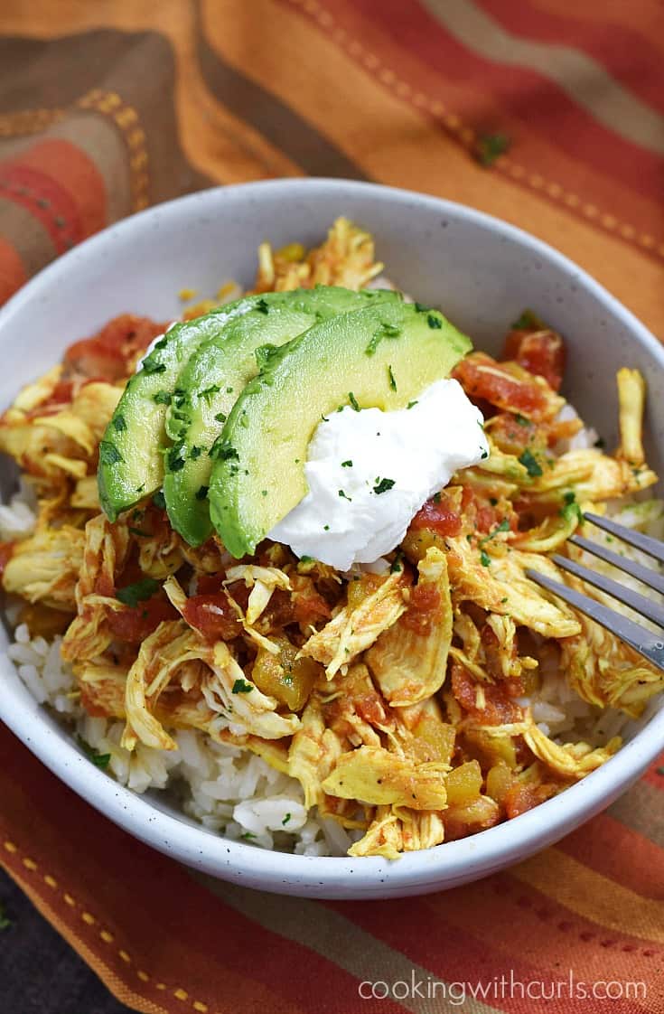 Adobo Slow Cooker Chicken served over rice and topped with Greek yogurt and avocado | cookingwithcurls.com