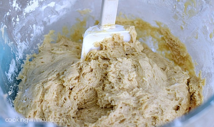 Flour mixed into wet ingredients to form a sticky dough.