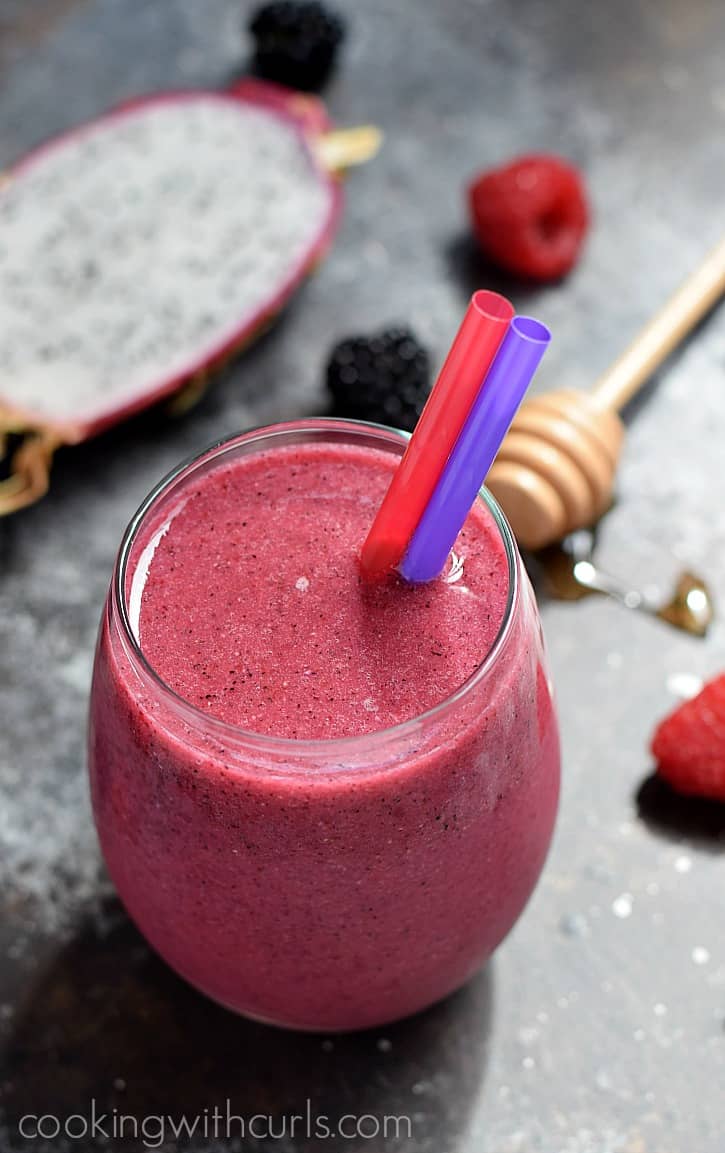 a gorgeous pink Dragon Fruit Smoothie in a small glass.