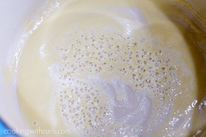 Melted butter and flour sizzling in a large pan.