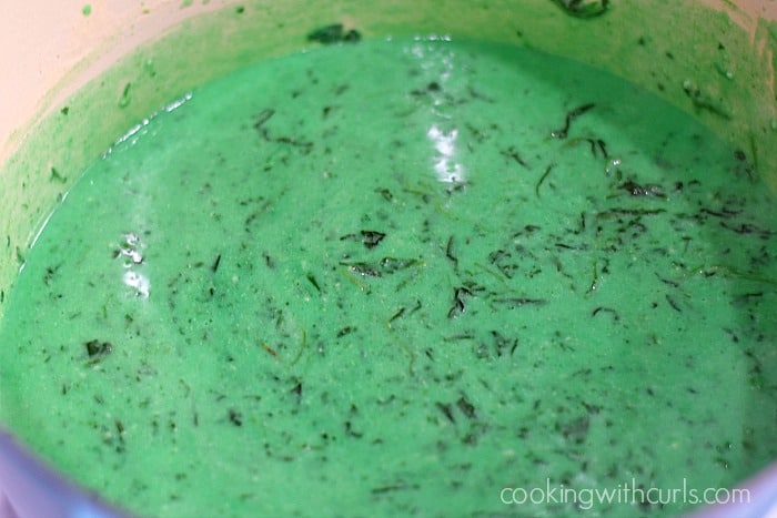 Dark green food coloring added to the cheese and spinach mixture.