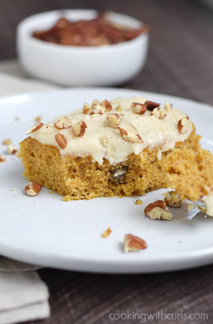 These Pumpkin Spice Bars are topped with a maple frosting and pecans for a delicious fall treat | cookingwithcurls.com