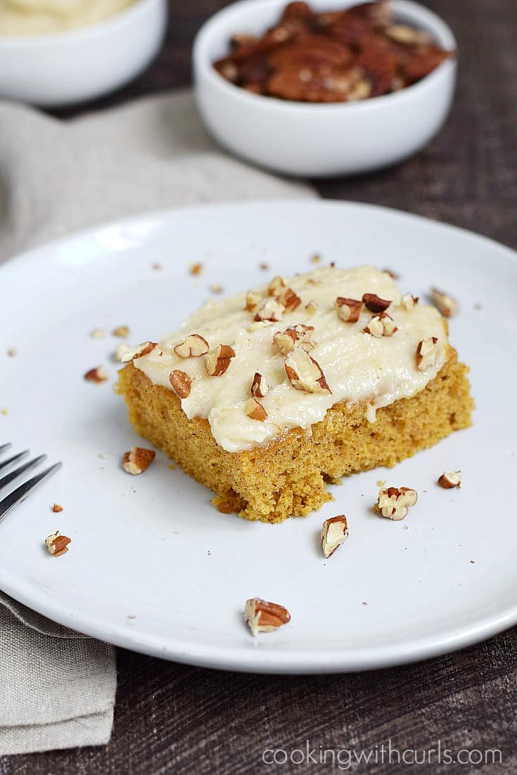 These Pumpkin Spice Bars have a cake-like texture and are topped with a maple frosting and toasted pecans | cookingwithcurls.com