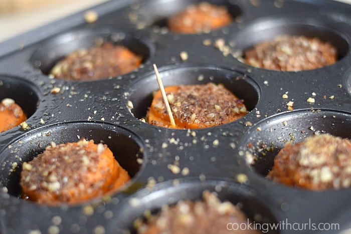 Candied sweet potato stacks baked in a muffin tin.