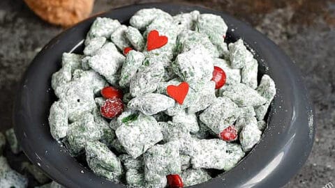 https://cookingwithcurls.com/wp-content/uploads/2016/11/Grinch-Puppy-Chow-recipe-overflowing-out-of-a-small-dog-bowl-with-a-stuffed-max-doll-in-the-background.-cookingwithcurls.com_-480x270.jpg