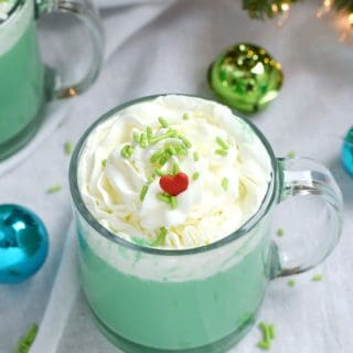 Keep warm during the holidays with a Naughty or Nice Grinch Hot Chocolate | cookingwithcurls.com