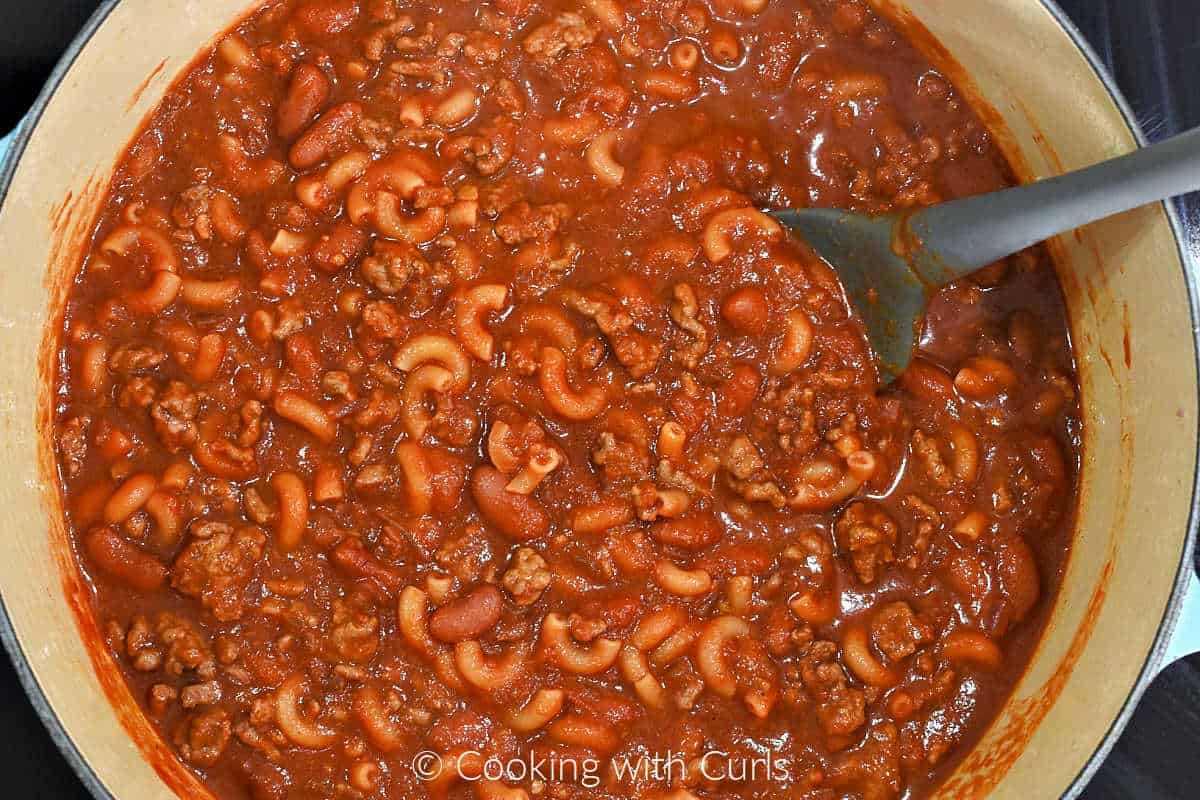 Cooked chili and macaroni in a large pot.