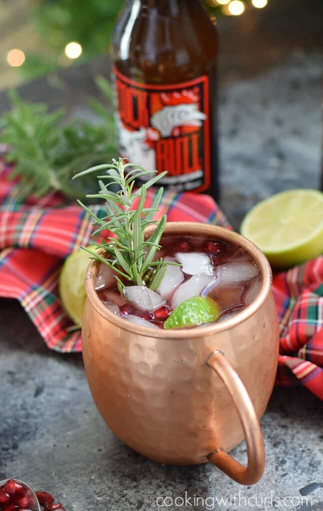 Spread holiday cheer this season and make some delicious Pomegranate Yule Mule cocktails for your family and friends | cookingwithcurls.com