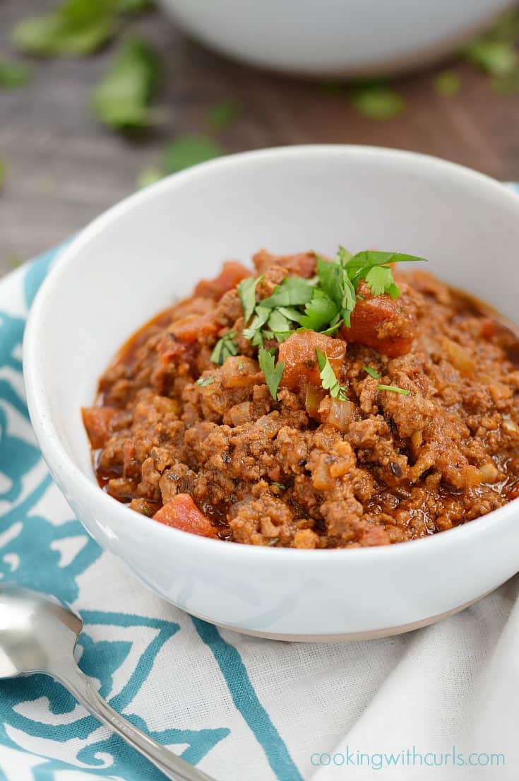 A bowl of bean-free chili in a bowl.