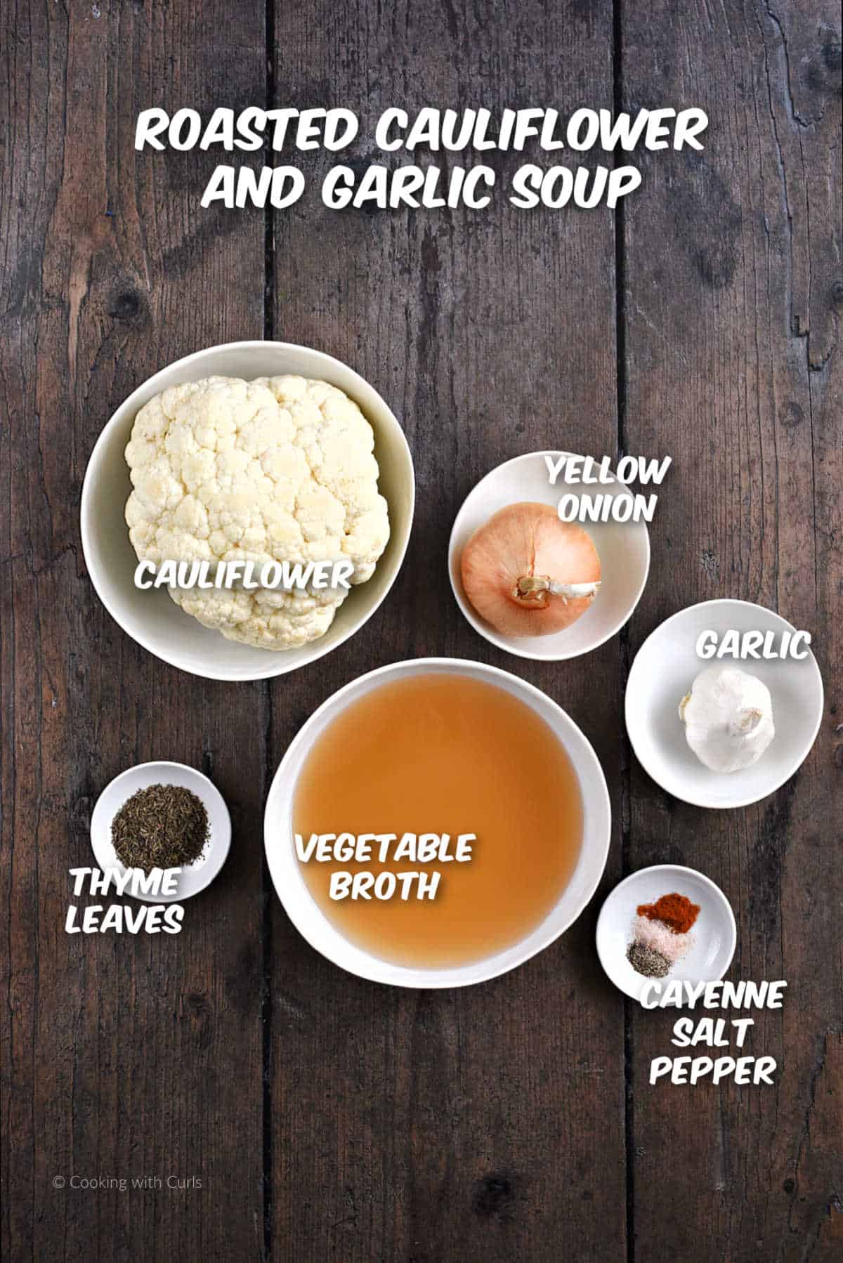 Ingredients needed to make roasted cauliflower and garlic soup.