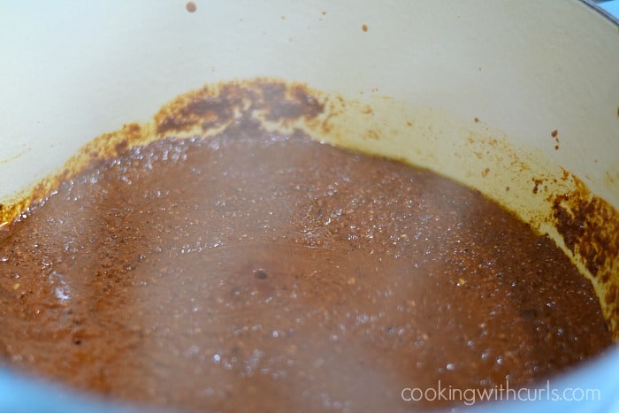 Chile sauce simmering in a large pot.