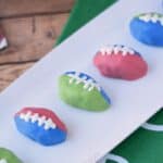 OREO Cookie Balls decorated in red and blue, and green and blue team colors.