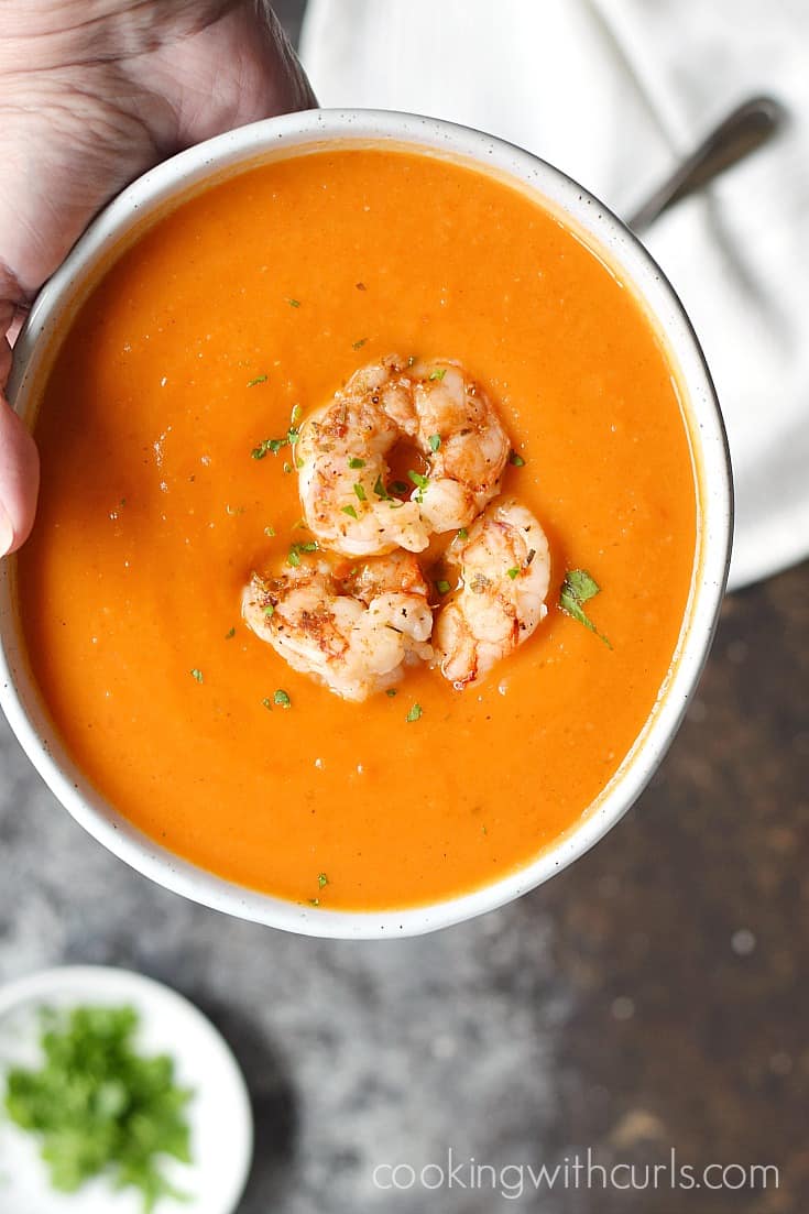 This Roasted Red Pepper Soup with Grilled Shrimp is the perfect way to warm up on cold winter days | cookingwithcurls.com