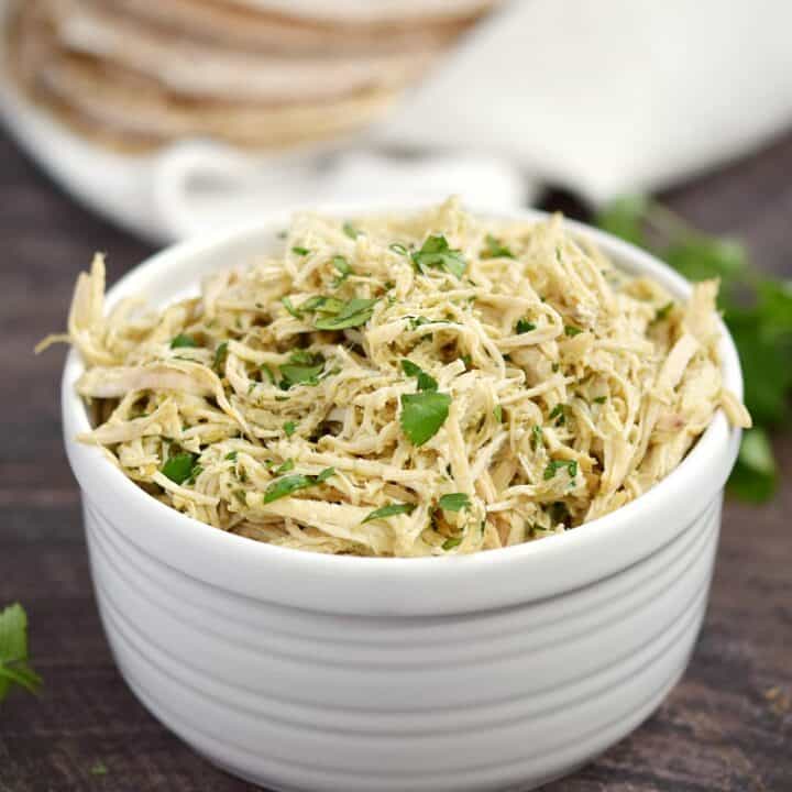 Instant Pot Salsa Verde Shredded Chicken Cooking with Curls