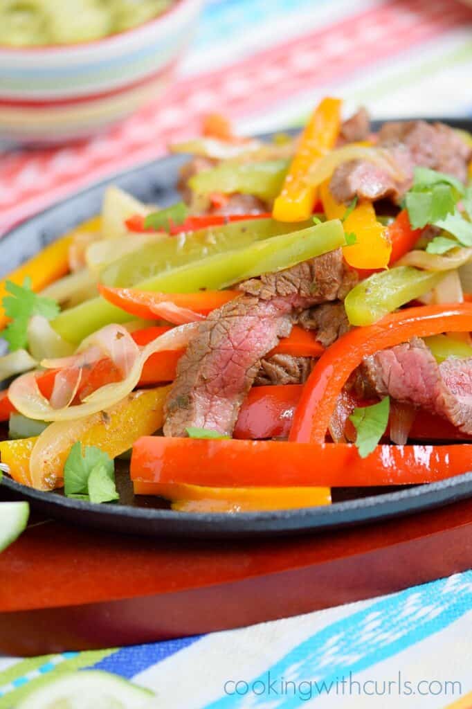 Grilled Steak Fajitas Cooking with Curls