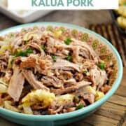 A bowl of shredded Instant Pot Kalua Pork with cabbage and title graphic across the top.