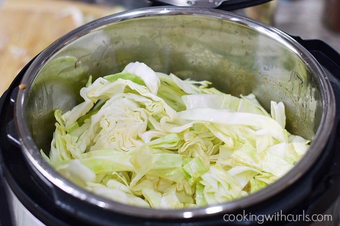 Cabbage inside the pressure cooker liner.