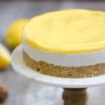 The only thing missing from this rich and creamy Paleo Lemon Cheesecake is the calories! cookingwithcurls.com #feastndevour