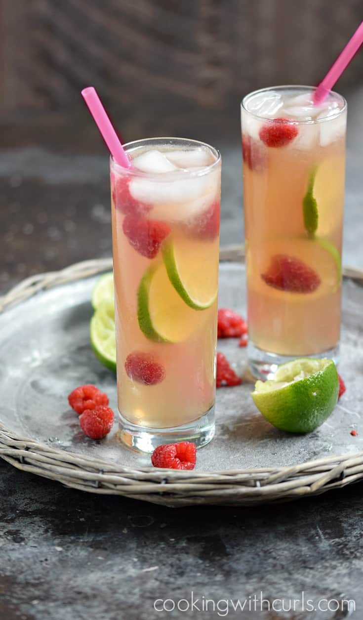 A light and refreshing Raspberry Fizz Cocktail is the perfect way to cool off on a hot summer night | cookingwithcurls.com