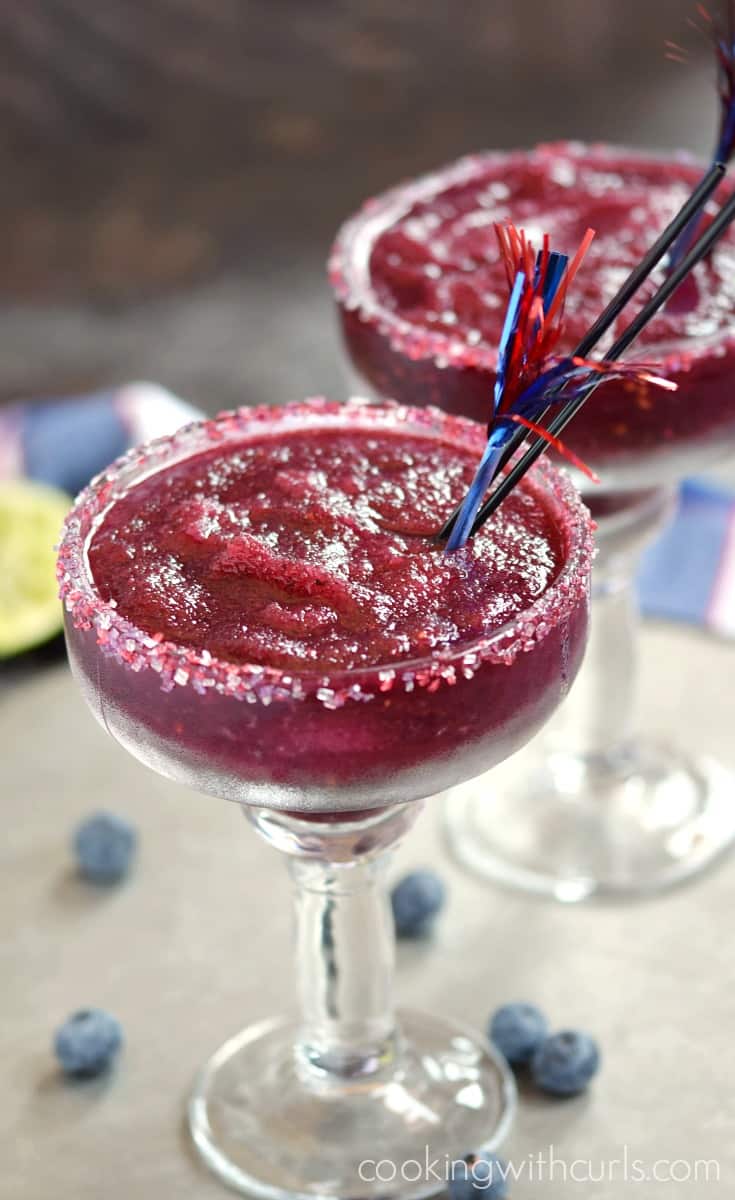 You can be festive and patriotic all summer long with these delicious Frozen Blueberry Margaritas! cookingwithcurls.com