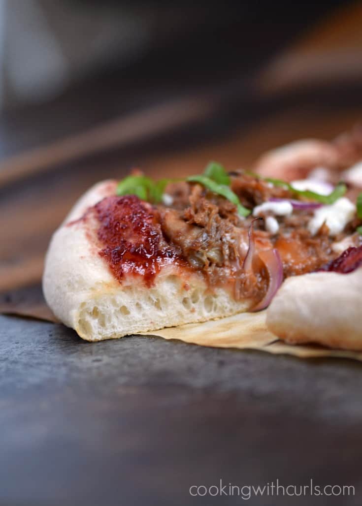 A slice of Cherry Bourbon Barbecue Pork Pizza | cookingwithcurls.com