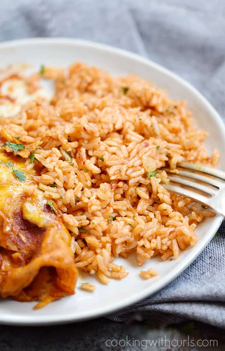 Instant Pot Spanish Rice is an easy side dish to serve alongside tacos, enchiladas, and burritos | cookingwithcurls.com