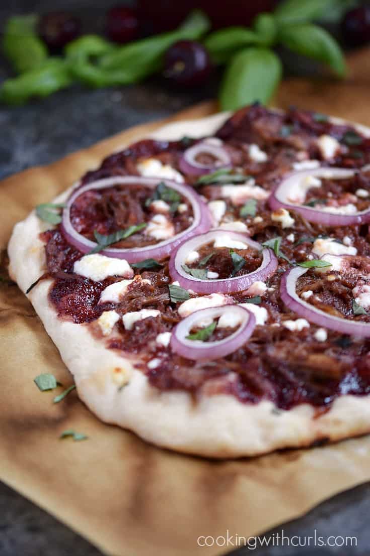 The sweet and tangy combination on this Cherry Bourbon Barbecue Pork Pizza will make this a family favorite | cookingwithcurls.com