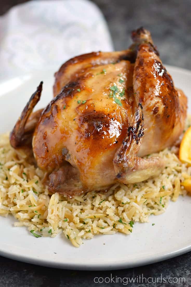 Jazz up date night with these delicious Orange Glazed Cornish Game Hens served on a bed of Rice Pilaf | cookingwithcurls.com